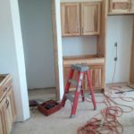 38.  Kitchen Cabinets are being installed