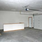 Attached Finished Garage with Sairs to Basement